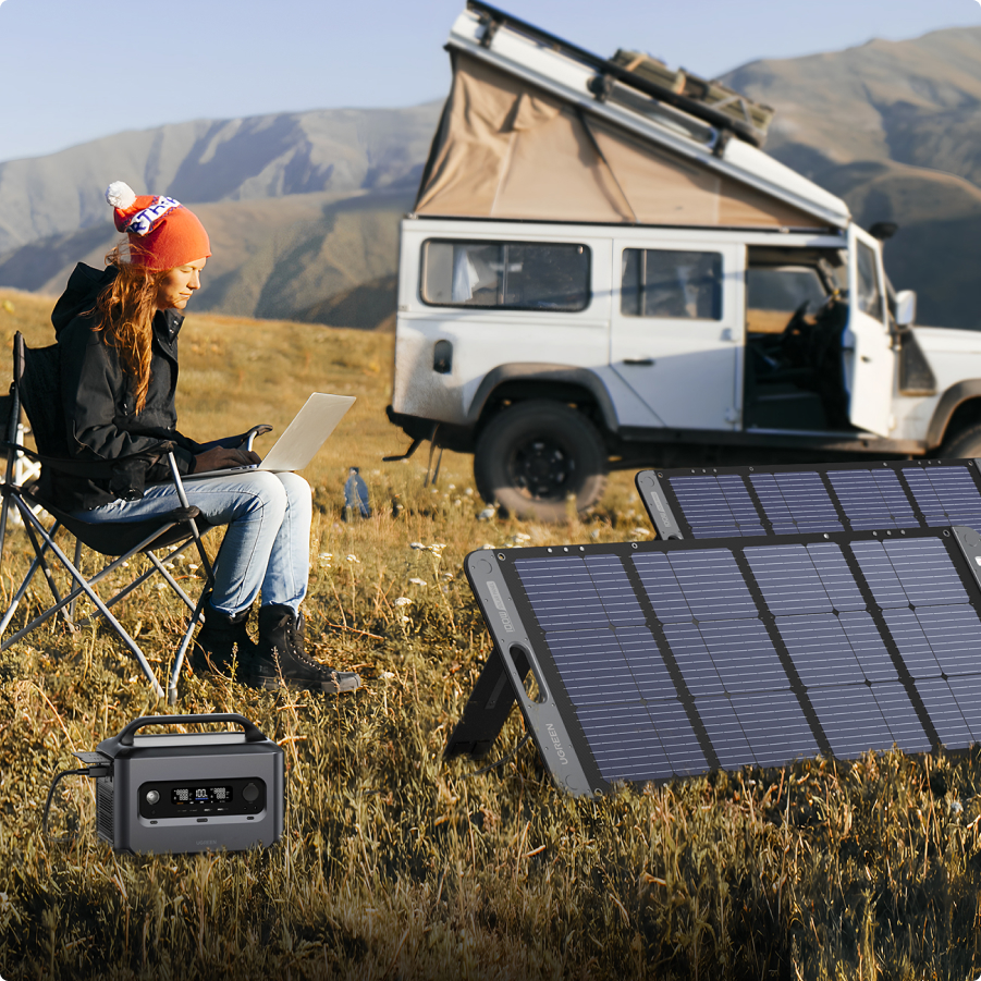 UGREEN mobile Solarpanele auf Wiese mit Powerstation
